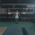 woman jumping rope in gym